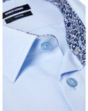 Light blue dress shirt with patterned inner lining and Remus Uomo label.